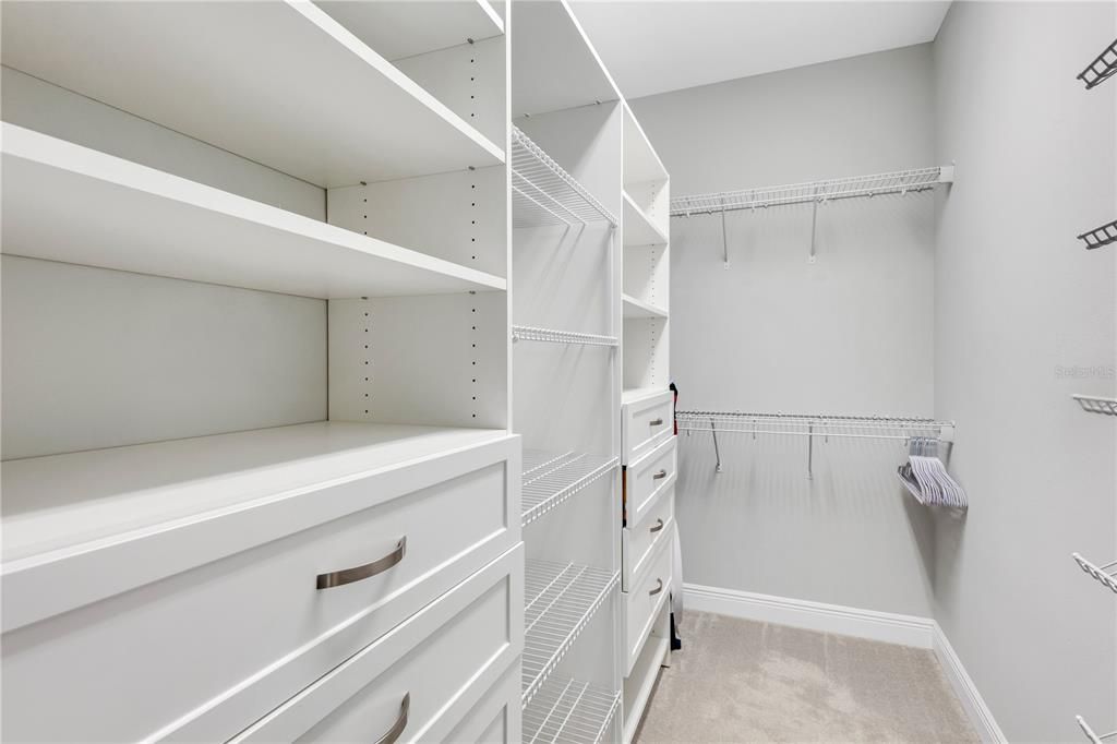 Master Bedroom Closet with Drawers and Shelves