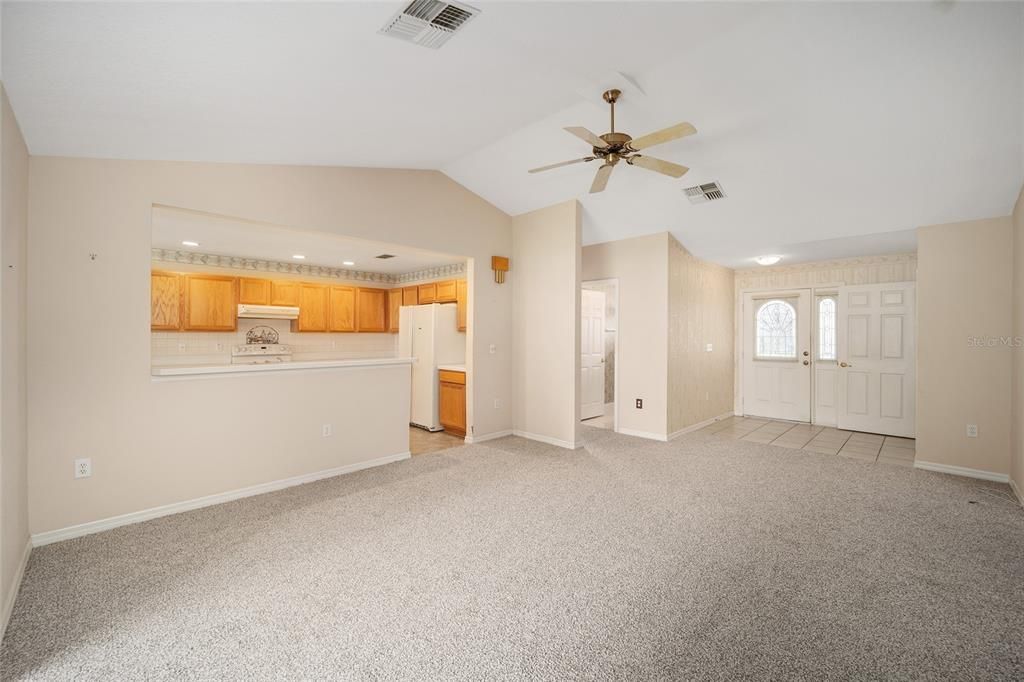 View from back of living area to front entry