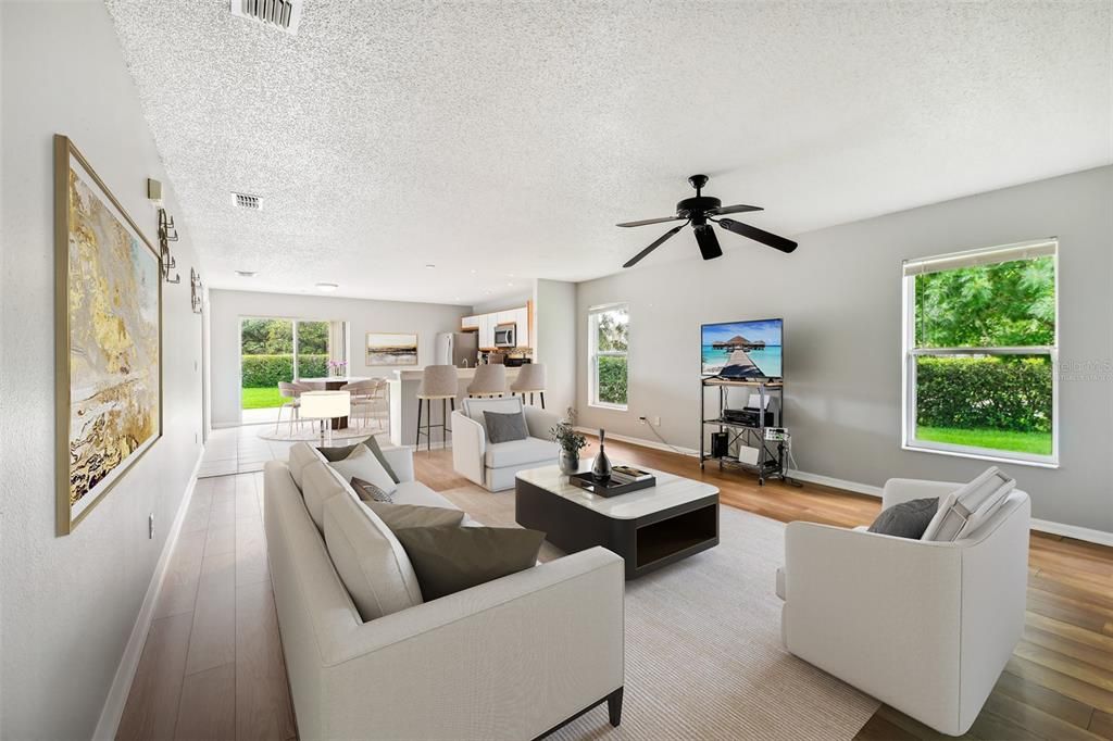 The living area is open to your EAT-IN KITCHEN with a comfortable layout allowing you to entertain family and friends with ease, WALK-IN PANTRY for ample storage and sliding glass door access to a large patio. Virtually Staged.