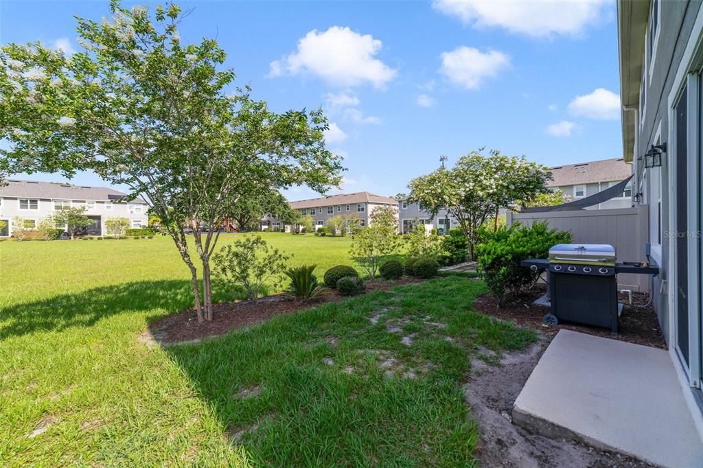 Enjoy the view of the courtyard/green space behind the home!