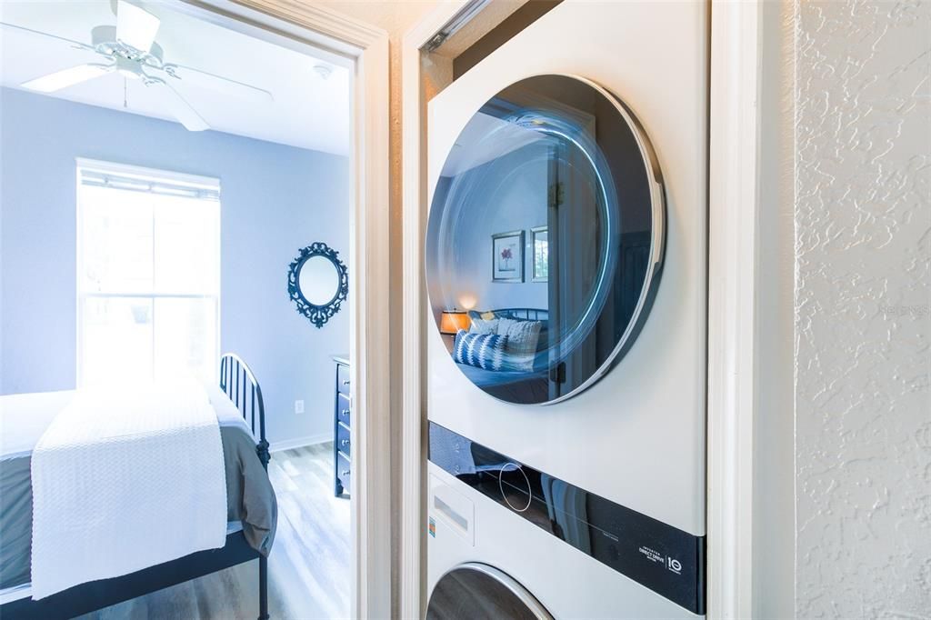 The laundry closet is just outside with a convenient stackable washer/dryer.