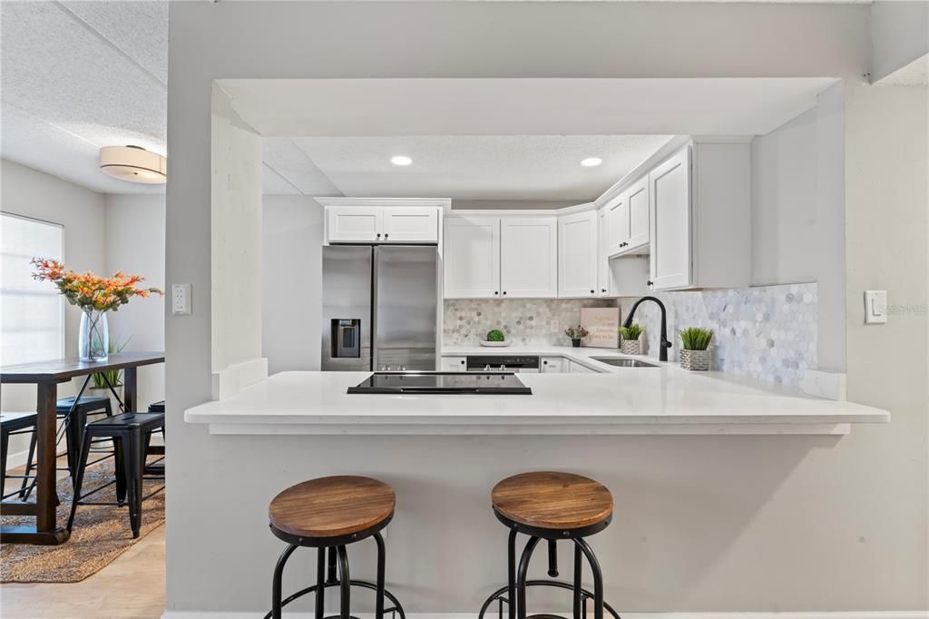 Breakfast Bar into Kitchen