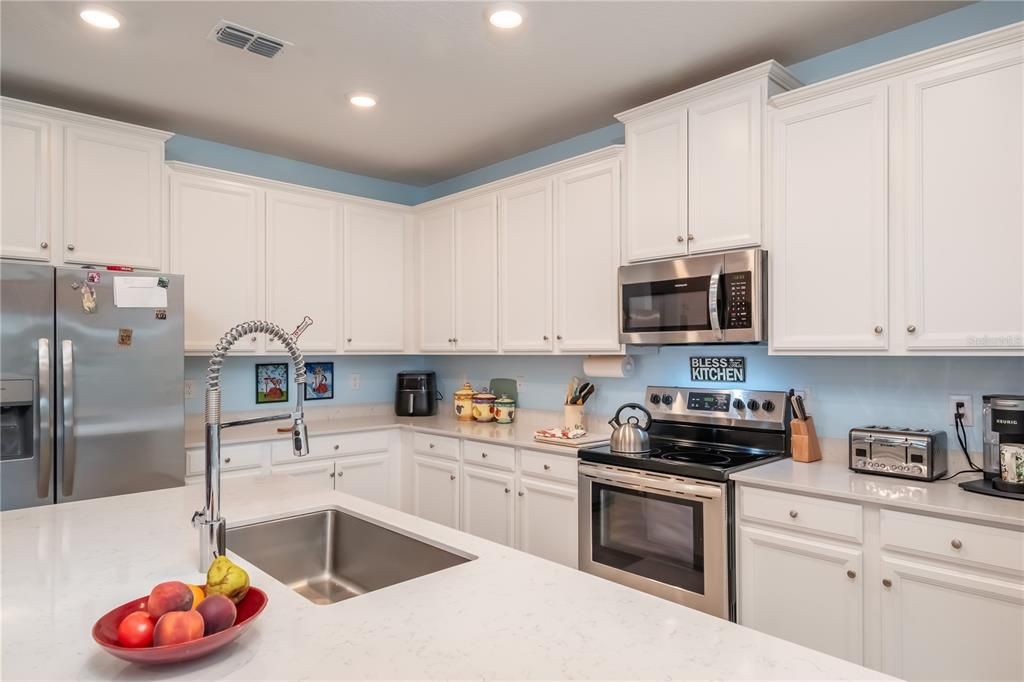 Large and functional kitchen with a nice view to the open back yard