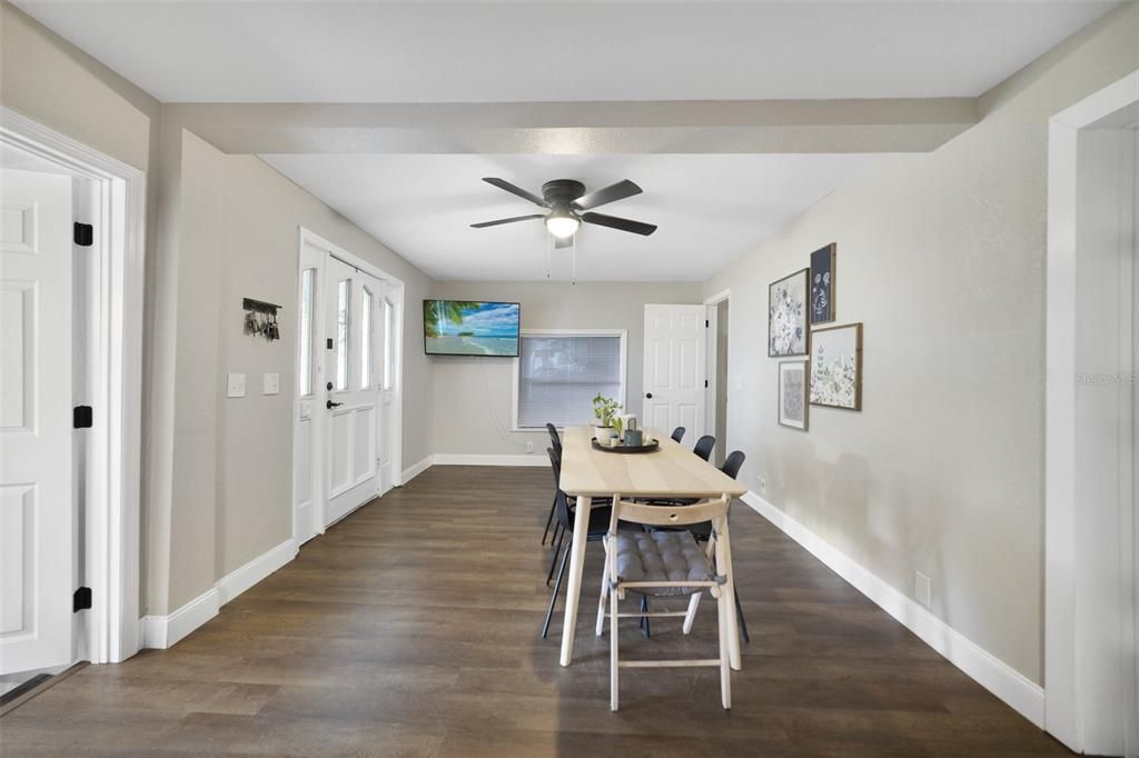 Laminate wood floors run throughout for easy maintenance and a cohesive look complimenting the many renovations that have been completed.