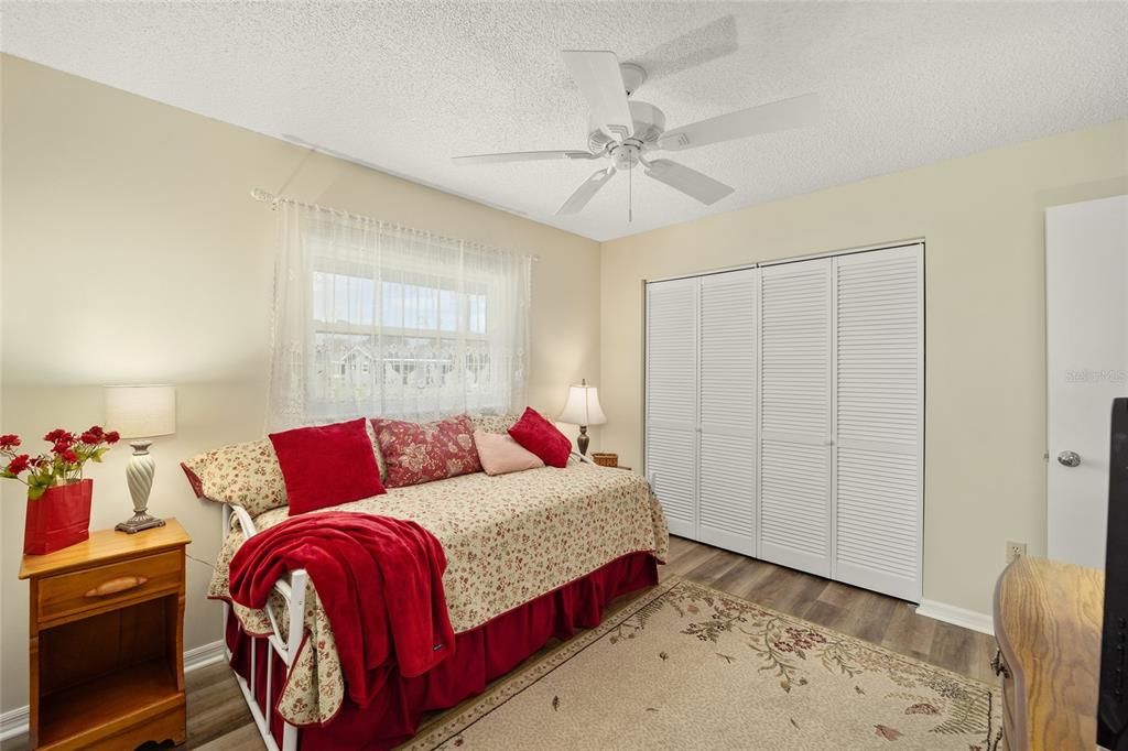 Guest Bedroom with Luxury Vinyl Flooring