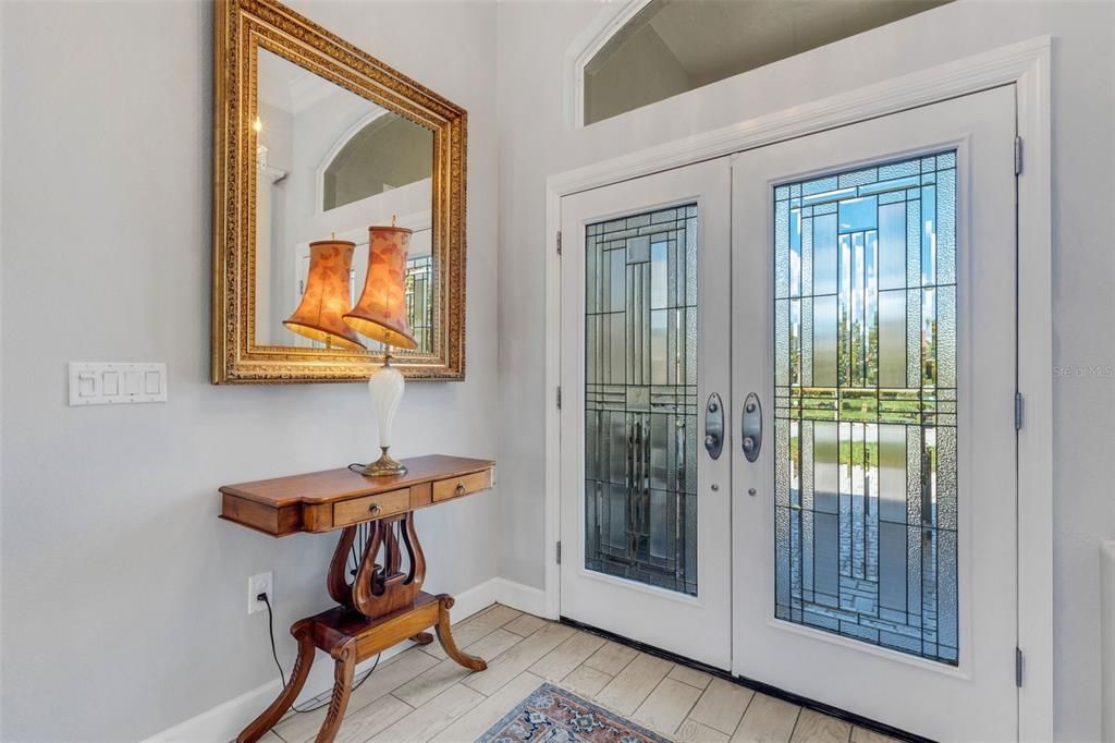 Where just the act of coming through the stunning double leaded-glass doors is a treat . . .