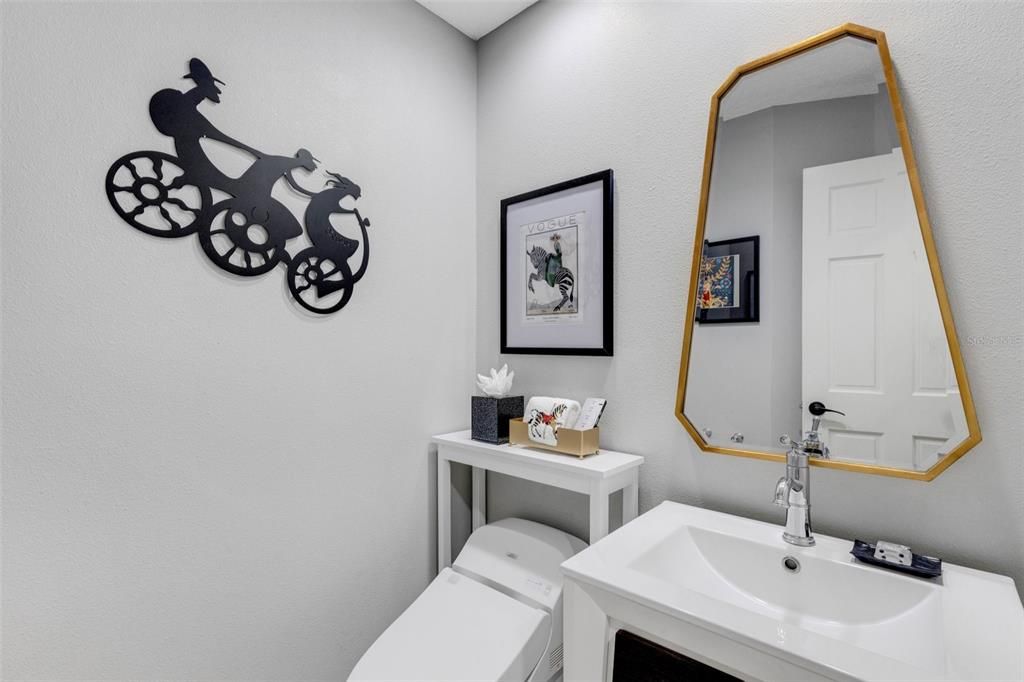 There is also a half-bath (powder room) for extra convenience with the gang stops by!