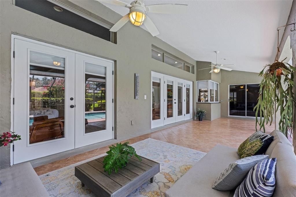 Multiple sets of french doors open to this space from many areas of the home.