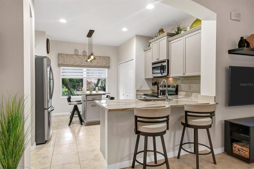 Sellers lowered the bar height countertops, added Quartz and added an island for the WOW