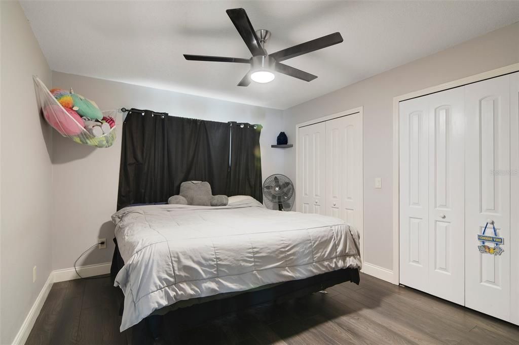 Three bedrooms share identically updated bathrooms for a cohesive look and all closets have BUILT-IN CLOSET ORGANIZERS.