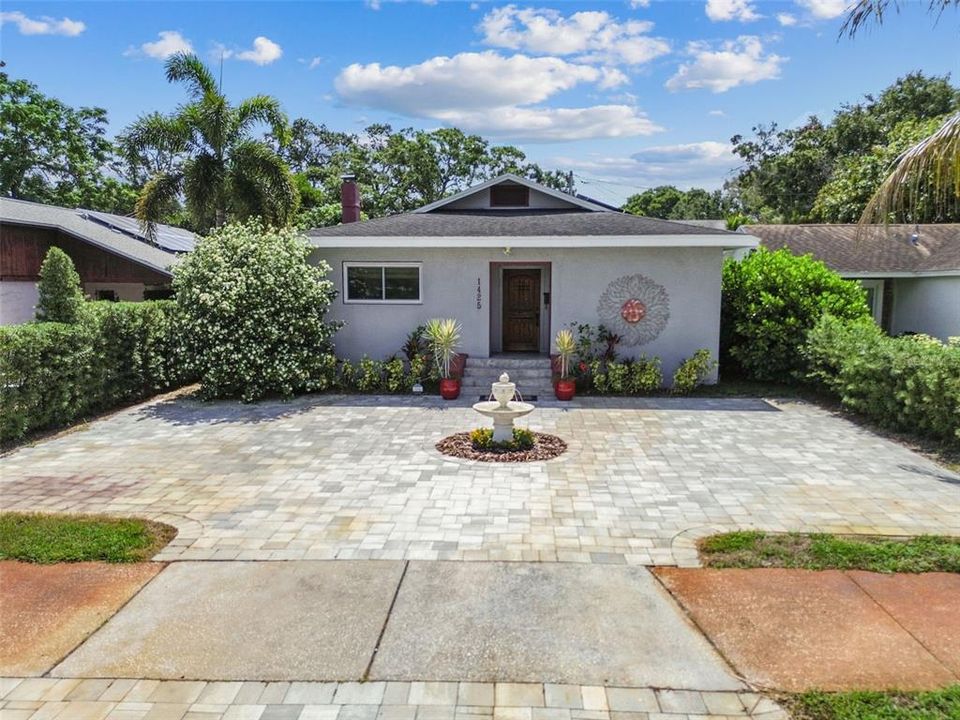 Serene fountain welcomes you to your paver drive