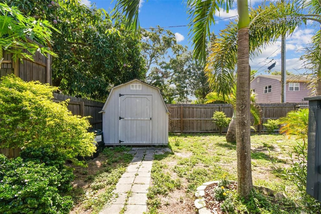 Additional outdoor storage in this large shed