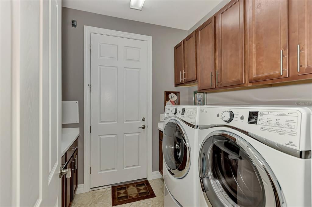 Laundry room with storage