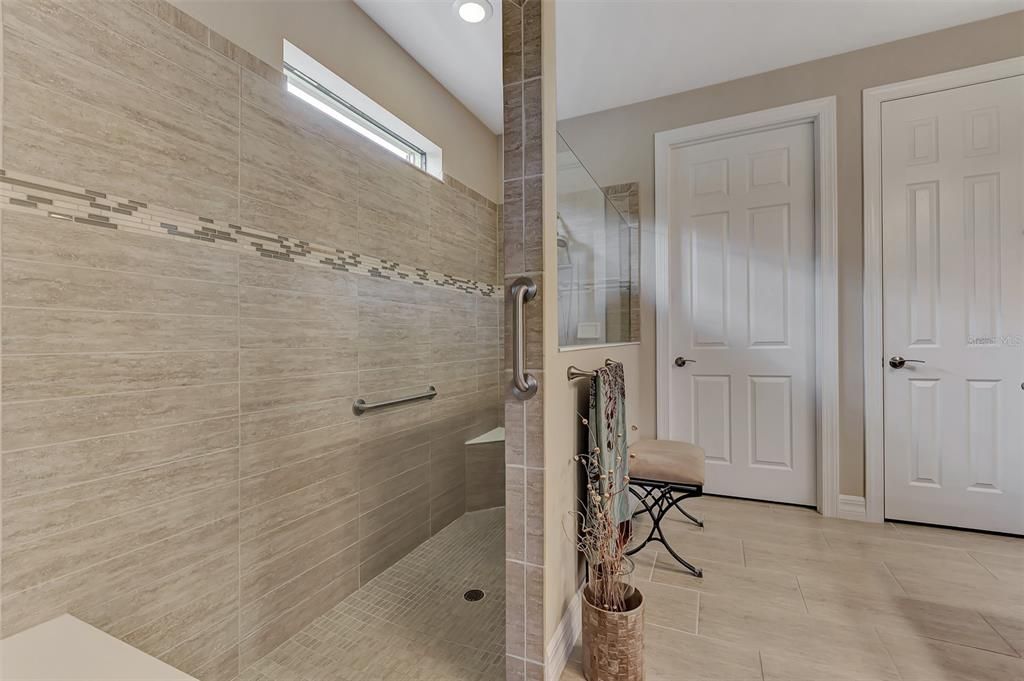 Oversized shower with grab bars