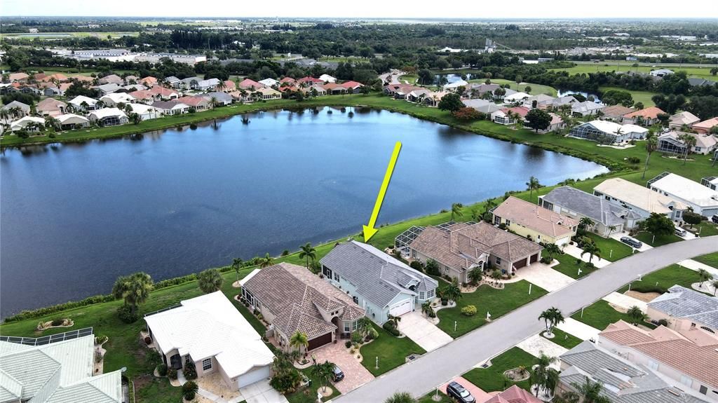 Aerial view of home and lake