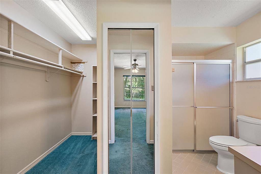 En-suite; with bathroom to the right, walk in closet to the left, separated by the linen closet