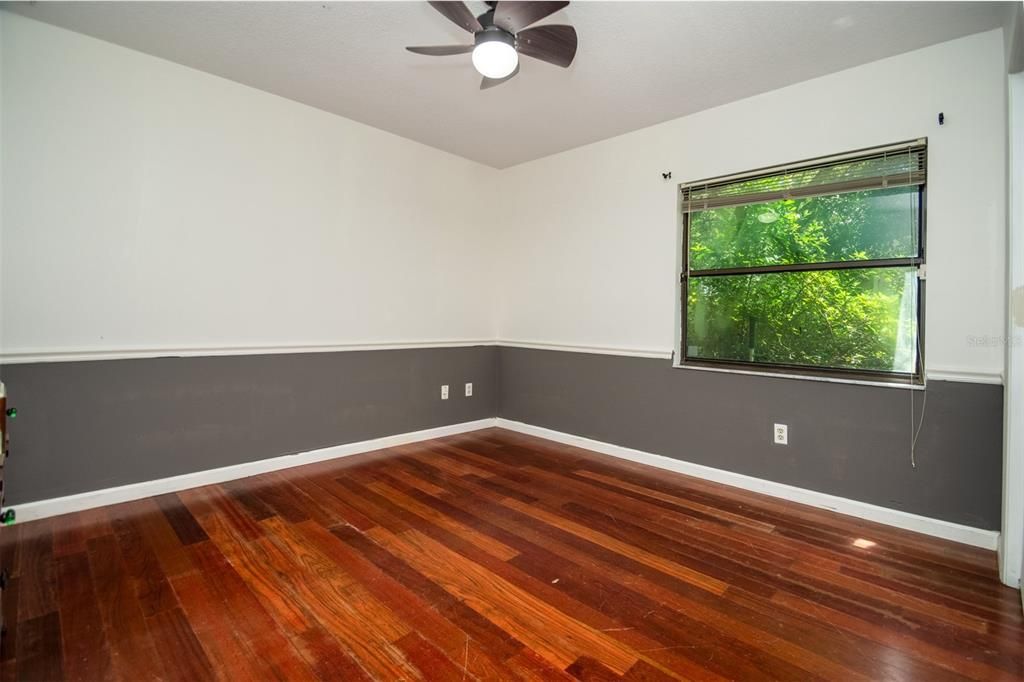 Bedroom 4 view of Wood Floors