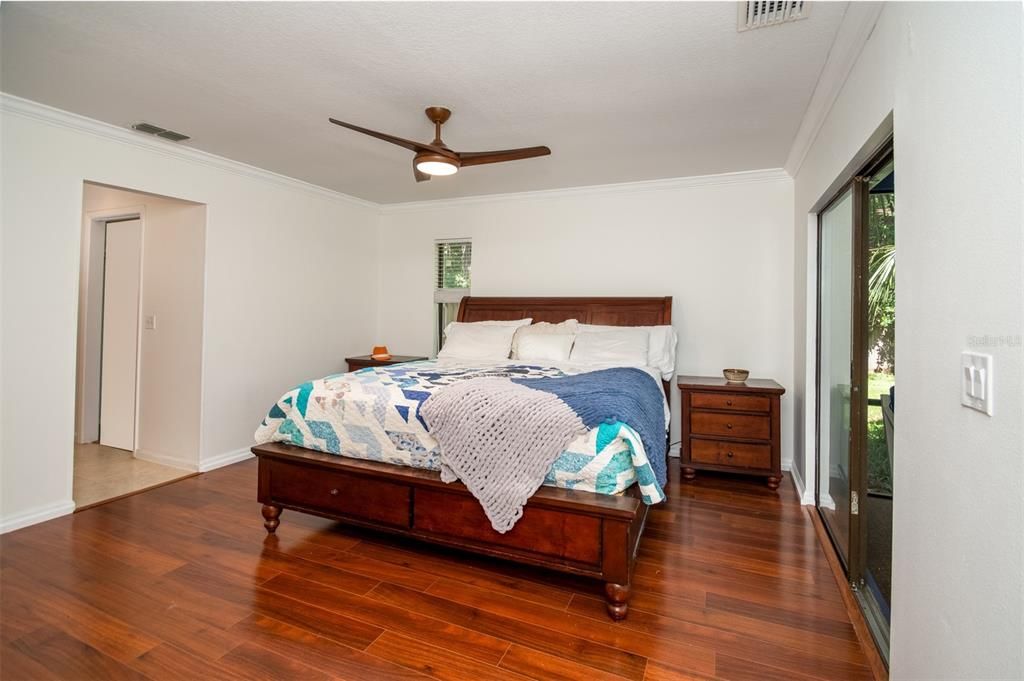 Master Bedroom with sliders to back Porch