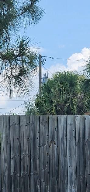 Power Pole behind lot.