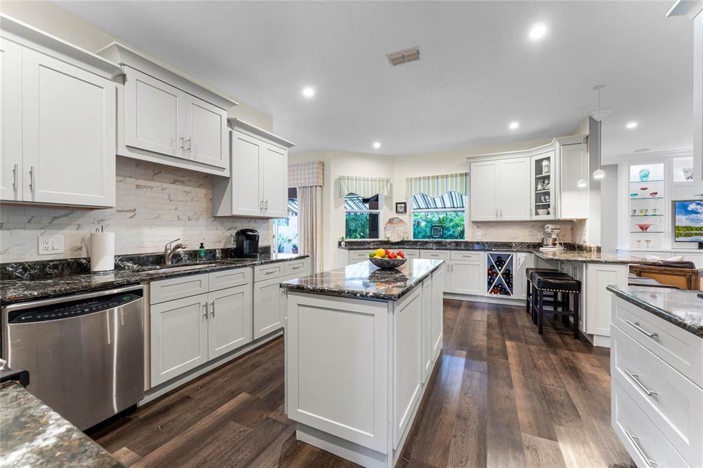 renovated kitchen with granite counter space