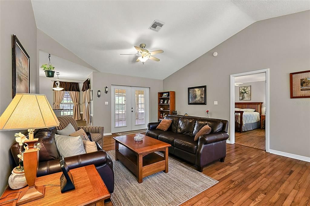 Living room with entry to the owner's suite