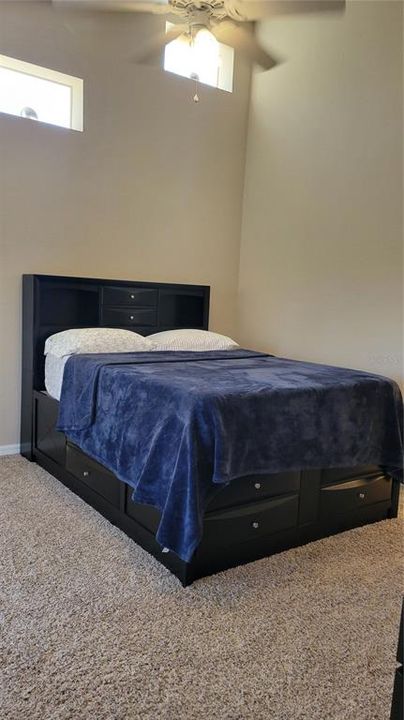 Main bedroom with high ceiling