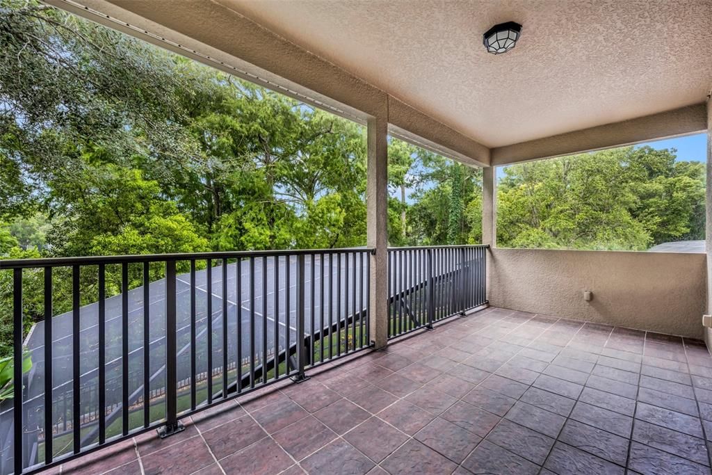 Balcony off bedroom 5 upstairs overlooking pool area