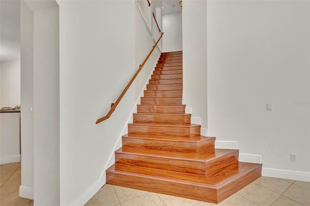 Staircase to 4 bedrooms and 2 bathrooms