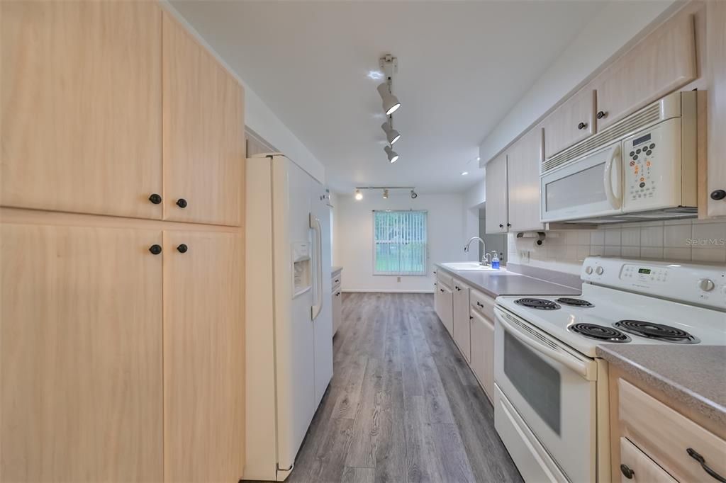 Kitchen stepping down to Family/Florida Room.