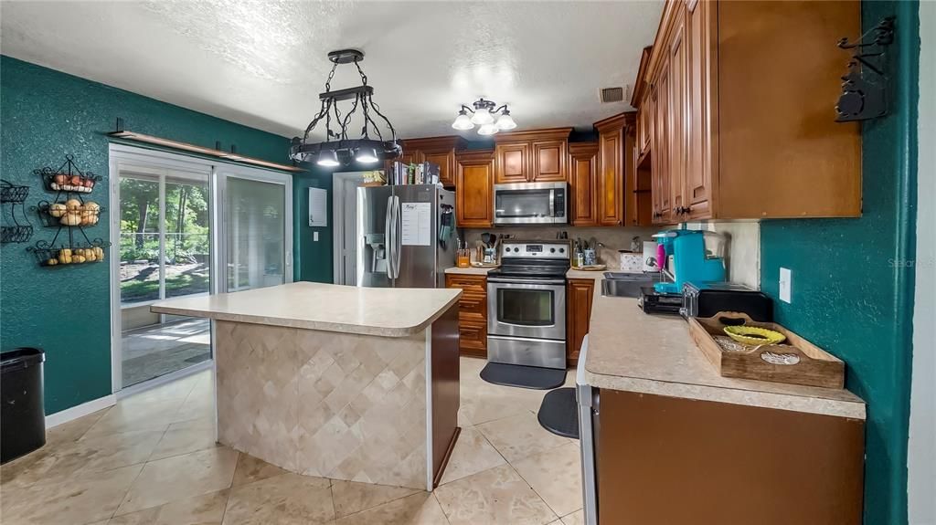 Kitchen with Island and Custom Wood Cabinets