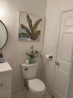 Downstairs half-bath with access to under the stairs storage!