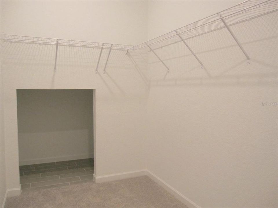 Walk-in closet toward storage area