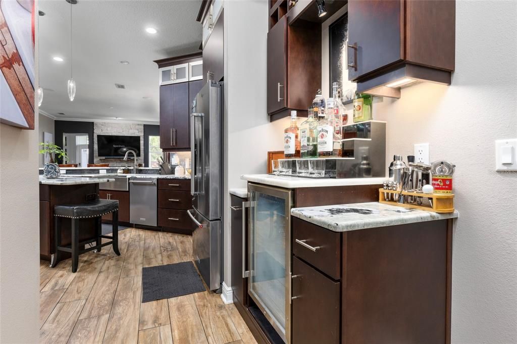 Kitchen w/ Custom Bar & Wine Fridge