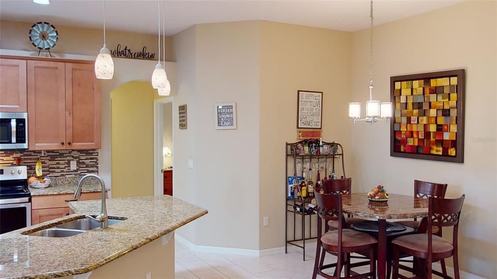 Separate bump-out bay kitchen nook, providing a cozy and charming space for casual dining.