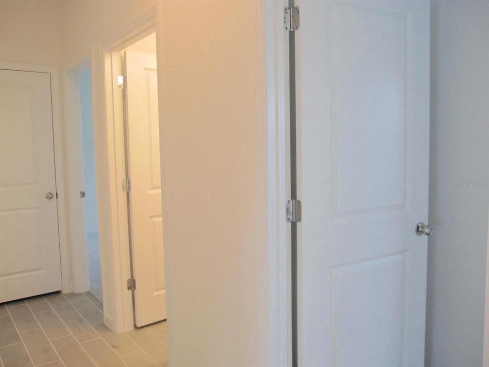 Entrance to bedrooms #2, #3 and 2nd full bathroom