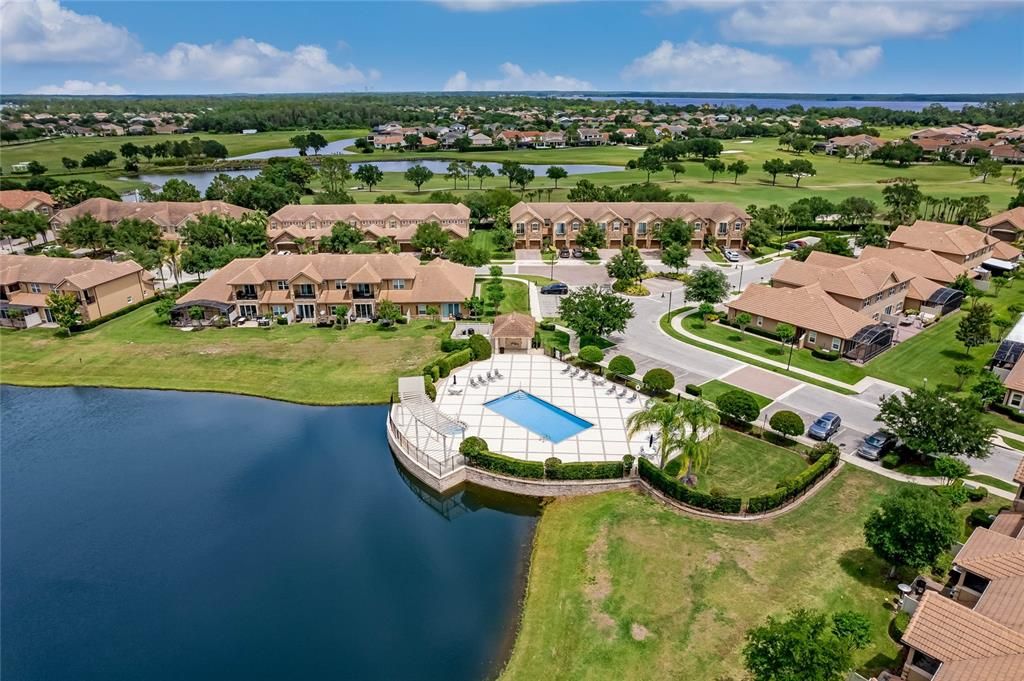 Community pool with lake view