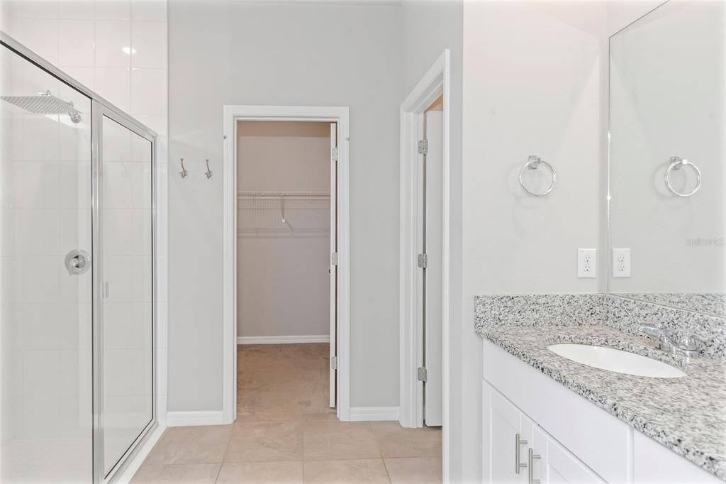 Ensuite bathroom with shower, vanity and Walk in closet.