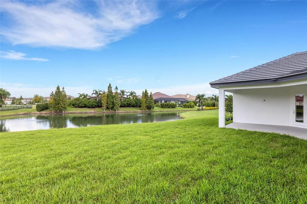 And, a serene view of the water feature behind the home.