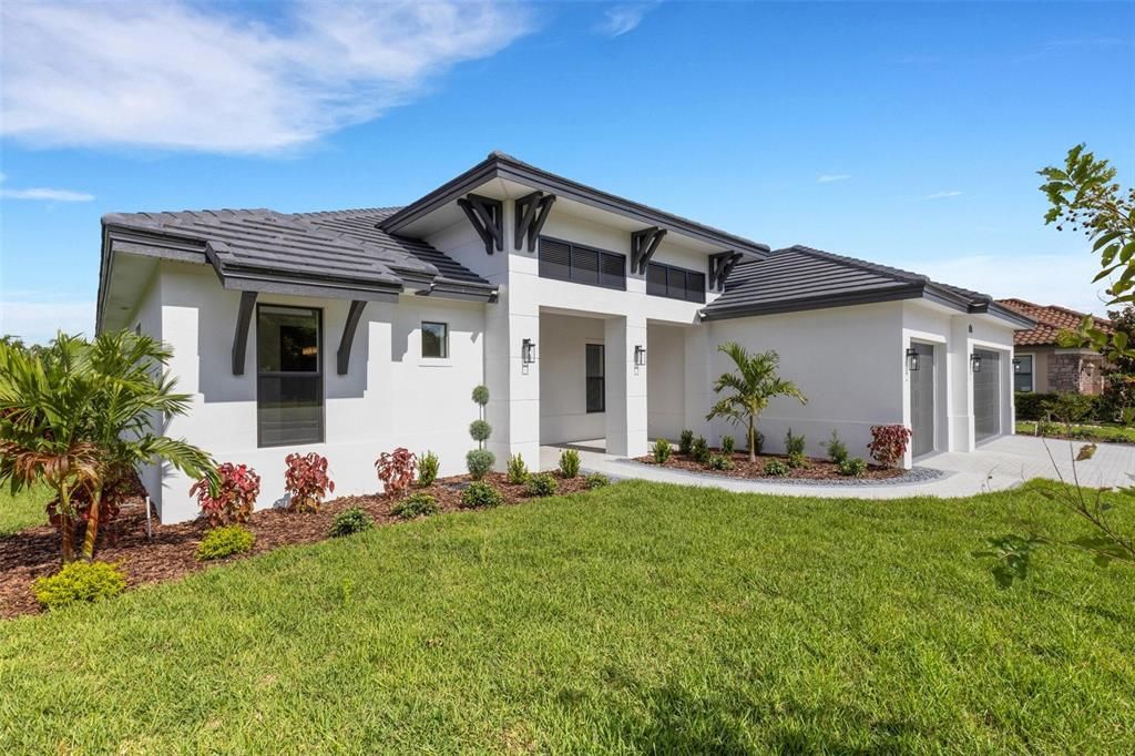 Sleek modern exterior and tile roof for easy maintenance.