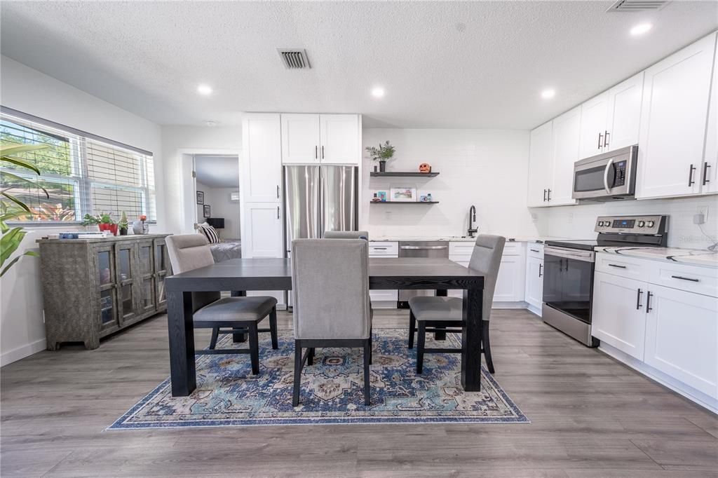 The open kitchen and dining area are ideal for entertaining.