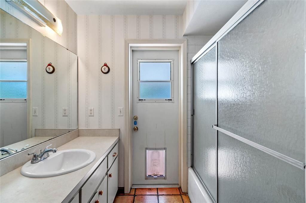 Guest Bathroom and Pool Door.