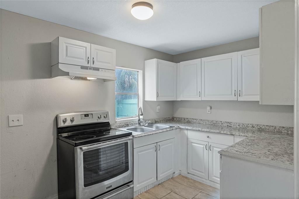 Kitchen overlooking the backyard