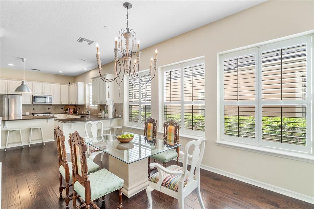 Dinette with oversized windows and plantation shutters