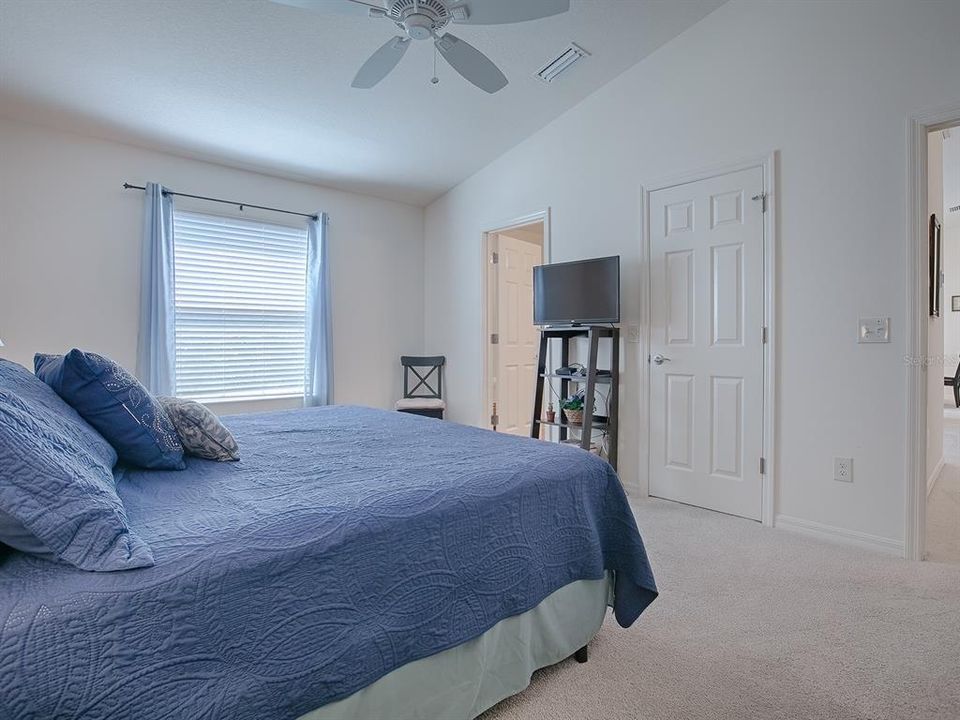 THE DOOR TO THE LEFT IS THE BATHROOM AND THE DOOR TO THE RIGHT IS THE WALK-IN CLOSET.