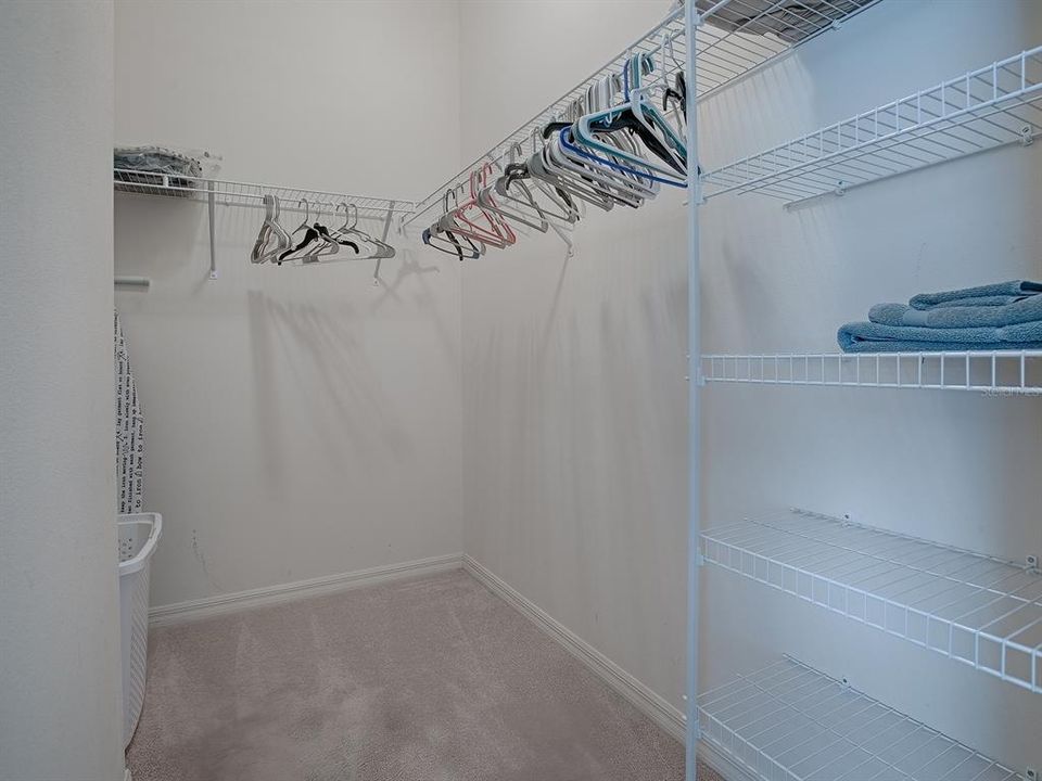 LARGE WALK-IN CLOSET WITH EXTRA SHELVING
