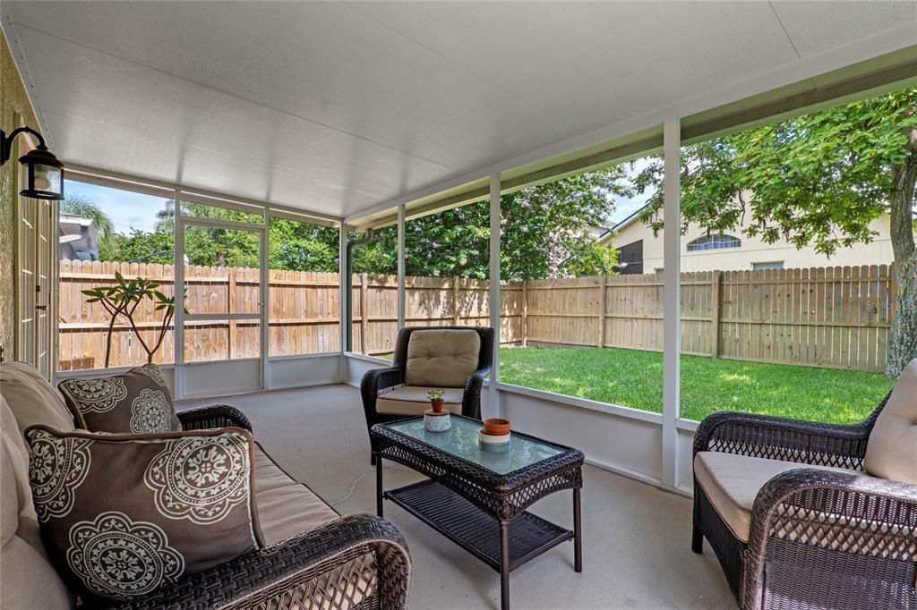 Enjoy privacy in your backyard under your screened patio!