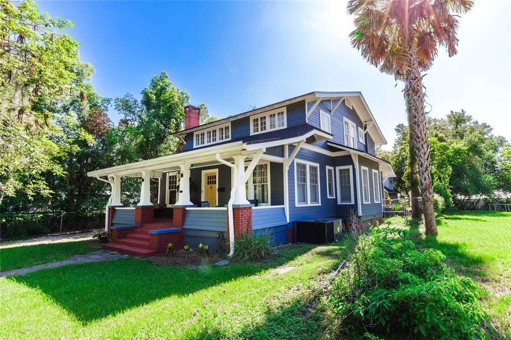 Covered front porch with porch swing