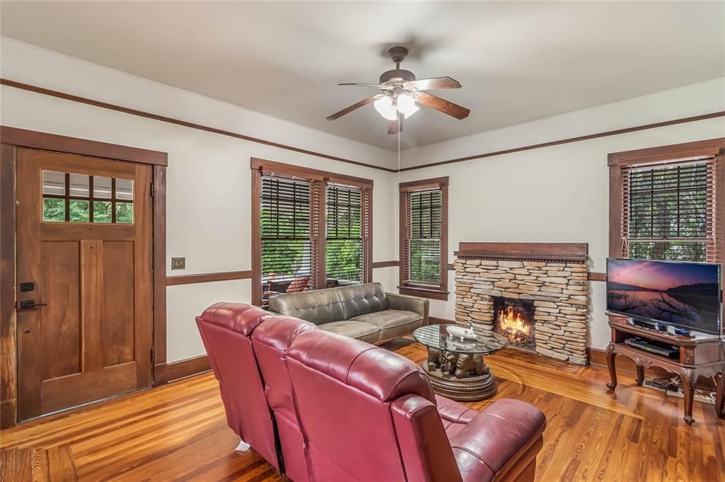 Living room with wood burning fireplace