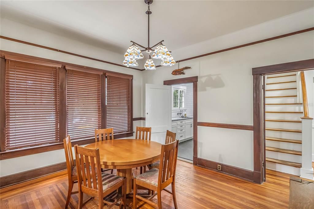 Dining room with view of kitchen door and bedroom door