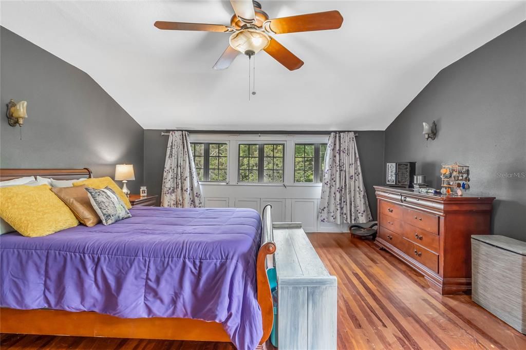 Primary bedroom with lots of natural light